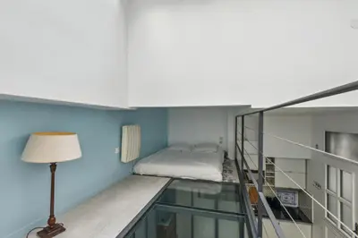 Un ou plusieurs lits dans un hébergement de l'établissement Atypique Loft 3 personnes with AC by Weekome
