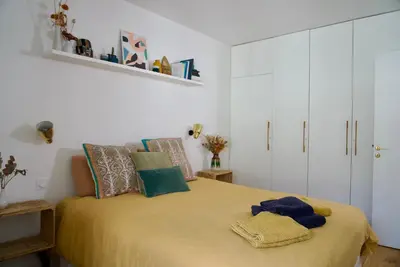Un ou plusieurs lits dans un hébergement de l'établissement Superbe appartement lumineux proche du Marais