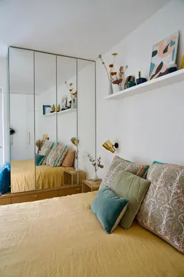 Un ou plusieurs lits dans un hébergement de l'établissement Superbe appartement lumineux proche du Marais