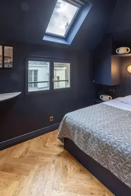 Un ou plusieurs lits dans un hébergement de l'établissement Midnight Suite - Marais