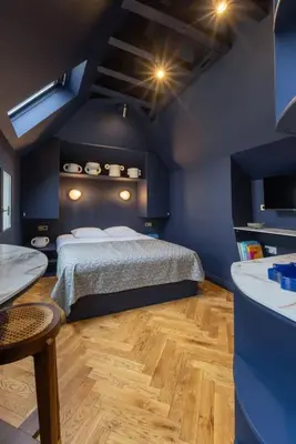Un ou plusieurs lits dans un hébergement de l'établissement Midnight Suite - Marais