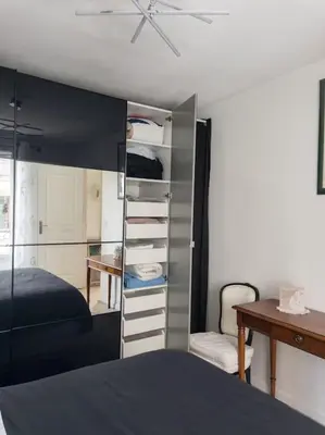 Un ou plusieurs lits dans un hébergement de l'établissement Appartement Paris La Défense Puteaux