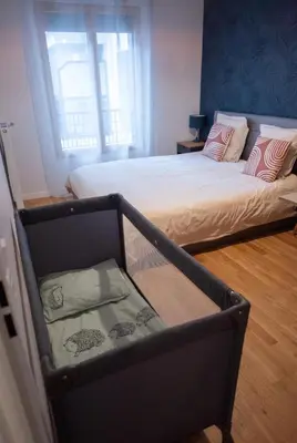 Un ou plusieurs lits dans un hébergement de l'établissement Sérénité totale : appartement ensoleillé