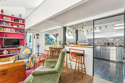 Cuisine ou kitchenette dans l'établissement Cosy apartment Place des Vosges