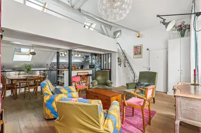 Coin salon dans l'établissement Cosy apartment Place des Vosges