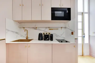 Cuisine ou kitchenette dans l'établissement Pick A Flat's Apartment in Place Vendôme - Rue Duphot