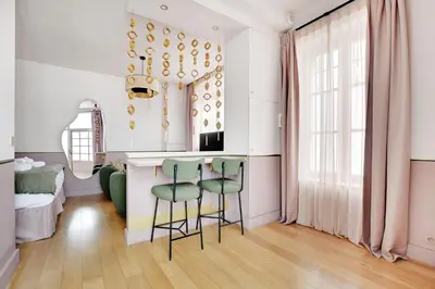 Télévision ou salle de divertissement dans l'établissement Pick A Flat's Apartment in Place Vendôme - Rue Duphot
