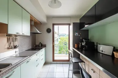 Cuisine ou kitchenette dans l'établissement Appartement du Théâtre - Welkeys