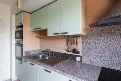 Cuisine ou kitchenette dans l'établissement Appartement du Théâtre - Welkeys