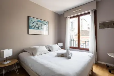Un ou plusieurs lits dans un hébergement de l'établissement Appartement du Théâtre - Welkeys