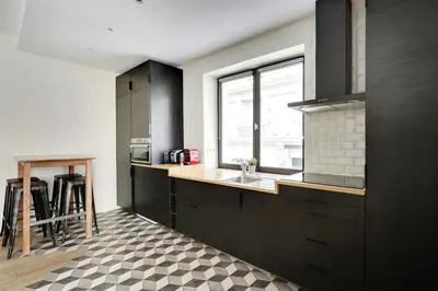 Cuisine ou kitchenette dans l'établissement Pick A Flat's Apartment in Le Marais - Rue Sainte Croix de la Bretonnerie