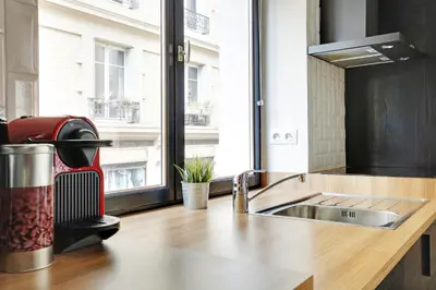 Cuisine ou kitchenette dans l'établissement Pick A Flat's Apartment in Le Marais - Rue Sainte Croix de la Bretonnerie