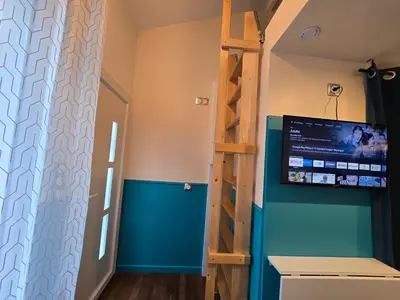 Télévision ou salle de divertissement dans l'établissement 4G- Studio cosy proche Paris