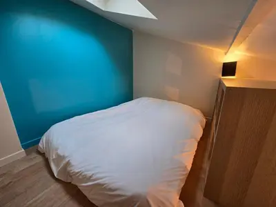 Un ou plusieurs lits dans un hébergement de l'établissement 4G- Studio cosy proche Paris