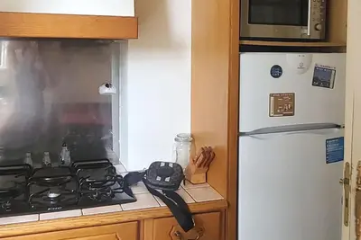 Cuisine ou kitchenette dans l'établissement Bel appartement aux portes de Paris
