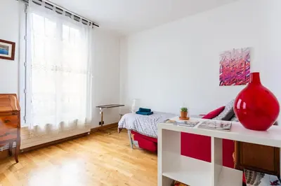 Coin salon dans l'établissement Bel appartement aux portes de Paris