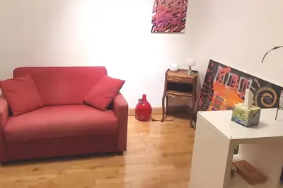 Coin salon dans l'établissement Bel appartement aux portes de Paris