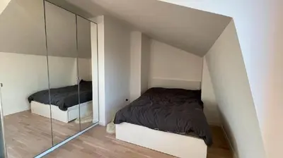 Un ou plusieurs lits dans un hébergement de l'établissement Modern apartment close to Paris
