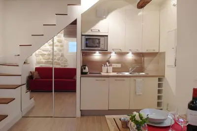 Cuisine ou kitchenette dans l'établissement Louvre Parisian Duplex