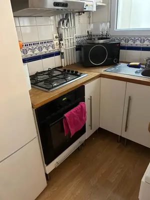 Cuisine ou kitchenette dans l'établissement Havre de paix Paris 9