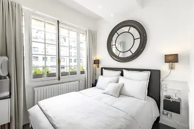 Un ou plusieurs lits dans un hébergement de l'établissement Sublime appartement climatisé proche Paris et Boulogne