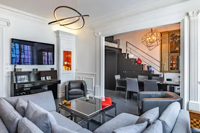 Coin salon dans l'établissement Sublime appartement climatisé proche Paris et Boulogne