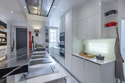 Cuisine ou kitchenette dans l'établissement Sublime appartement climatisé proche Paris et Boulogne