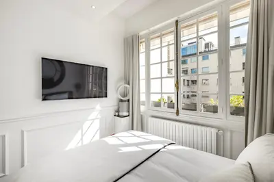 Télévision ou salle de divertissement dans l'établissement Sublime appartement climatisé proche Paris et Boulogne