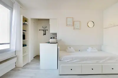 Un ou plusieurs lits dans un hébergement de l'établissement Cozy studio - 2P - Place de la Bastille