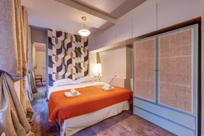 Un ou plusieurs lits dans un hébergement de l'établissement Le Marais - Les Halles Colorful & Modern 3BD