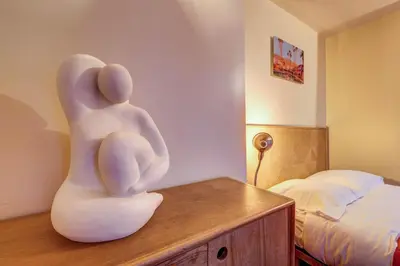 Un ou plusieurs lits dans un hébergement de l'établissement Le Marais - Les Halles Colorful & Modern 3BD