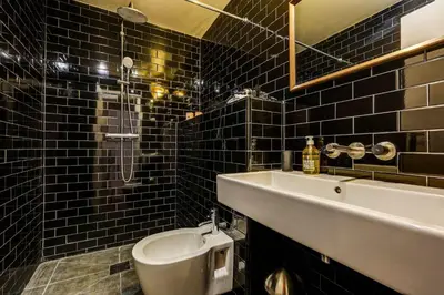 Salle de bains dans l'établissement Le Marais - Les Halles Colorful & Modern 3BD