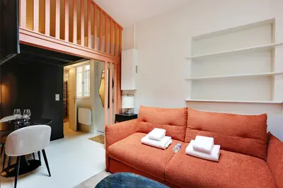 Coin salon dans l'établissement Appartement Chic and Cosy-Canal Saint Martin