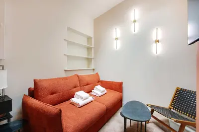 Coin salon dans l'établissement Appartement Chic and Cosy-Canal Saint Martin