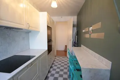 Cuisine ou kitchenette dans l'établissement Spacieux 2 Pièces Montmartre