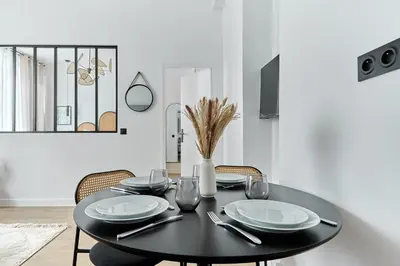 Télévision ou salle de divertissement dans l'établissement Apartment Center of Paris Bastille by Studioprestige