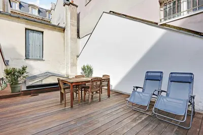 Coin salon dans l'établissement Cozy appartment avec Terrace - 2BR-4P - Centre de Paris