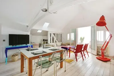 Télévision ou salle de divertissement dans l'établissement Cozy appartment avec Terrace - 2BR-4P - Centre de Paris