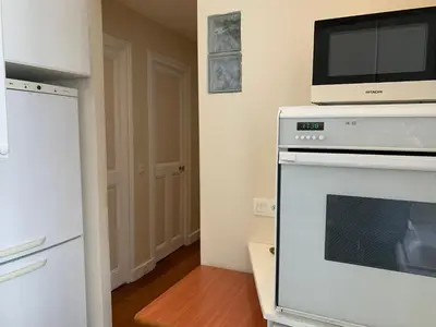 Cuisine ou kitchenette dans l'établissement Chaleureux 3 pièces haussmanien au cœur du Quartier Latin