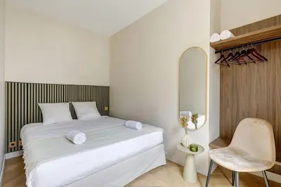 Un ou plusieurs lits dans un hébergement de l'établissement Sublime Apartment Champs Elysées 8Guests 3Bdr
