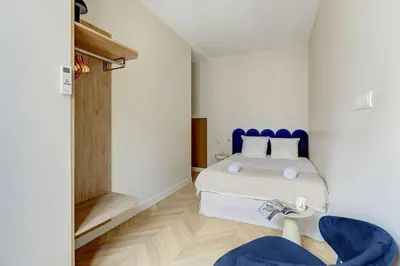 Un ou plusieurs lits dans un hébergement de l'établissement Sublime Apartment Champs Elysées 8Guests 3Bdr