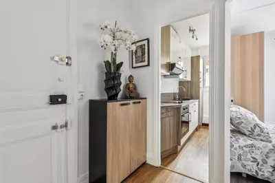 Un ou plusieurs lits dans un hébergement de l'établissement Paris Elegant 1BR in front of Montparnasse - Metro 2min - 50