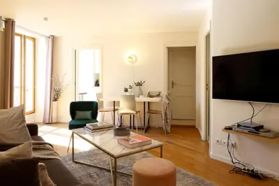 Télévision ou salle de divertissement dans l'établissement Apt Opéra-Richelieu/Heart of Paris