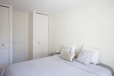 Un ou plusieurs lits dans un hébergement de l'établissement Apt Opéra-Richelieu/Heart of Paris