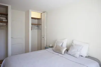 Un ou plusieurs lits dans un hébergement de l'établissement Apt Opéra-Richelieu/Heart of Paris