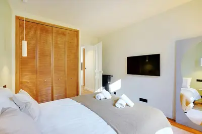 Un ou plusieurs lits dans un hébergement de l'établissement Luxury flat silly - Boulogne city center
