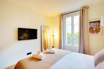 Un ou plusieurs lits dans un hébergement de l'établissement Luxury flat silly - Boulogne city center