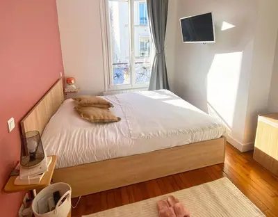 Un ou plusieurs lits dans un hébergement de l'établissement Appartement lumineux à Levallois, proche métro & Paris