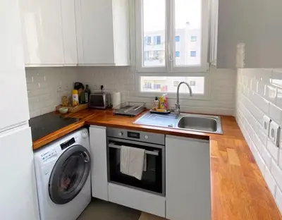 Cuisine ou kitchenette dans l'établissement Appartement lumineux à Levallois, proche métro & Paris