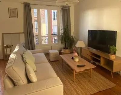 Coin salon dans l'établissement Appartement lumineux à Levallois, proche métro & Paris
